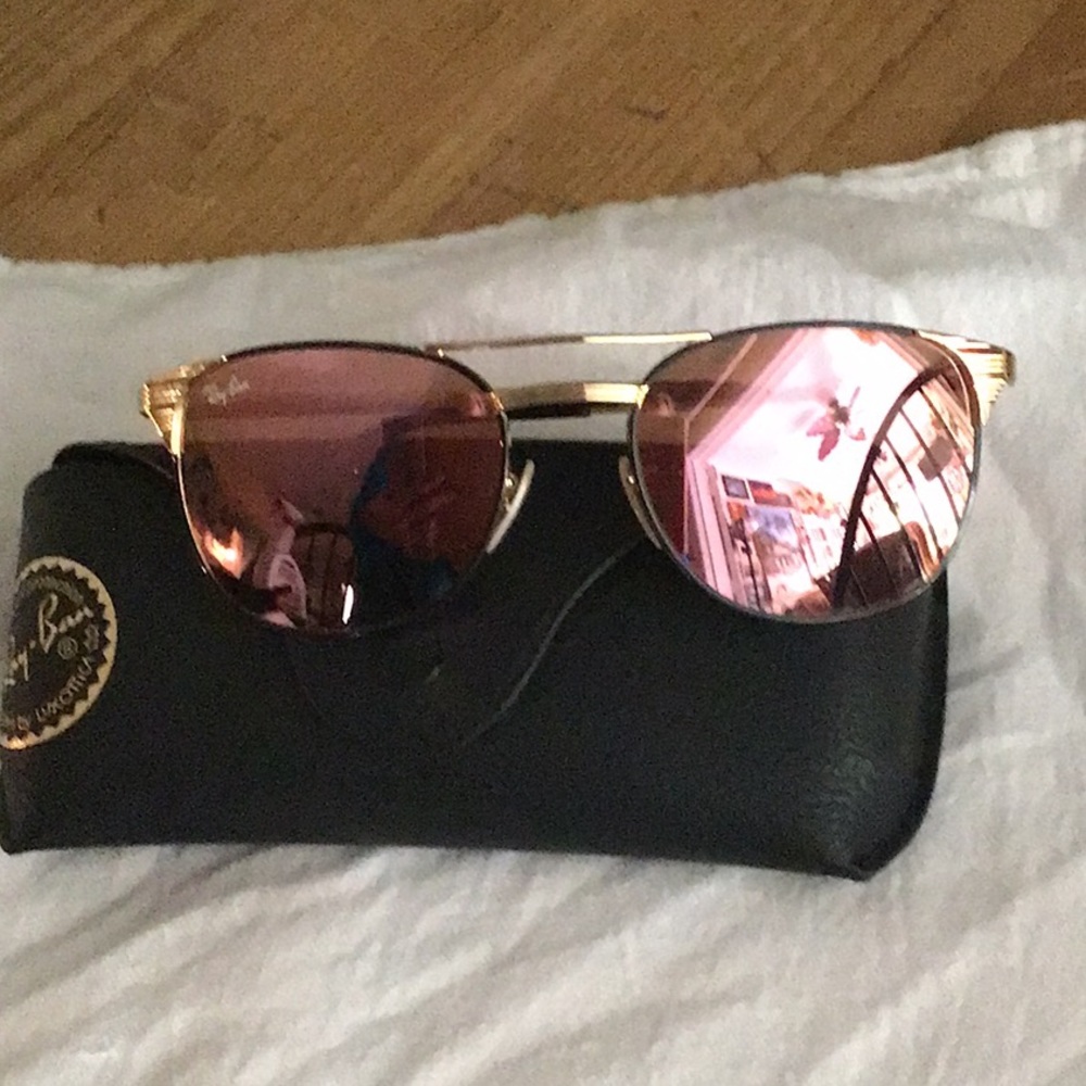 Like new ray bans gold aviator style with pink reflective lense
